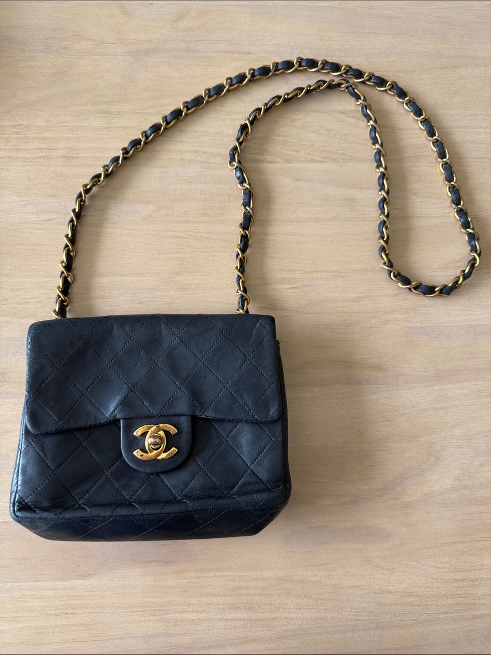 AUTHENTIC Vintage black quilted CHANEL bag with gold hardware